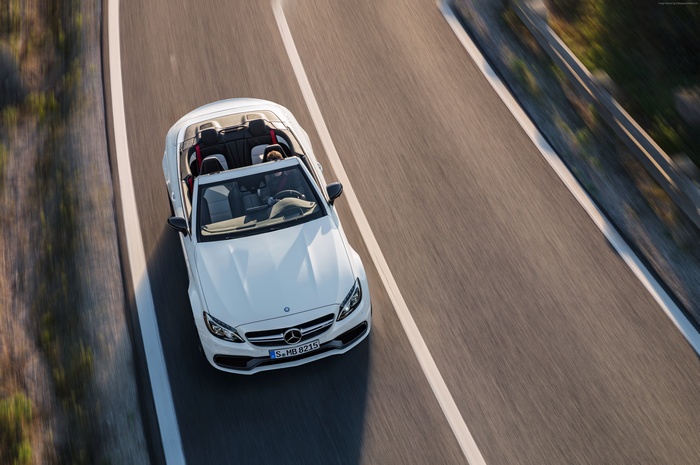 White Mercedes-AMG C 63 S Cabriolet on a Road