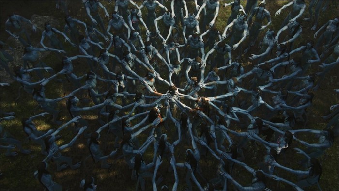 Na'vi people holding hands in a circle