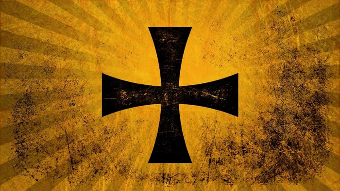 Black cross on a grunge yellow sunburst background