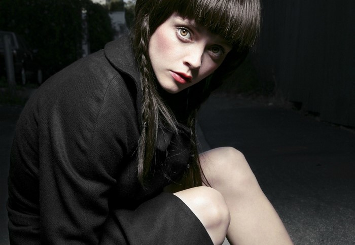 Christina Ricci in a black coat