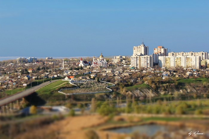 Cityscape with churches and apartment buildings