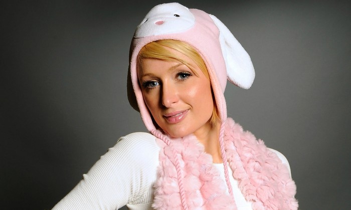 Paris Hilton wearing a pink bunny hat and scarf