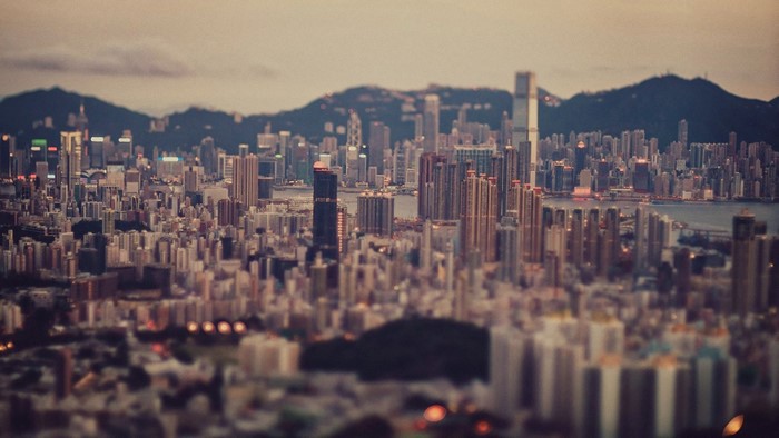 Cityscape with mountains at dusk