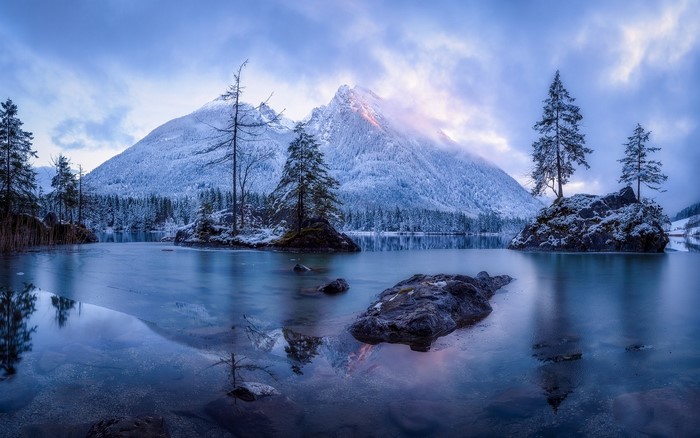 Snow-covered mountains and lake in winter