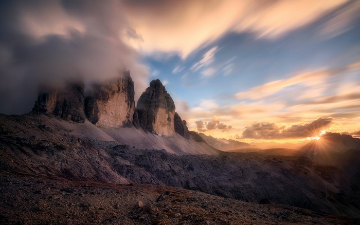 Sunset Over the Italian Alps with Dramatic Clouds
