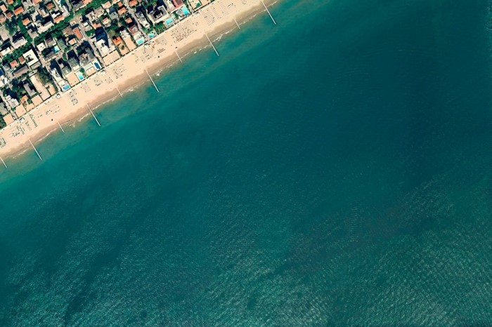 Aerial view of a beach and turquoise ocean