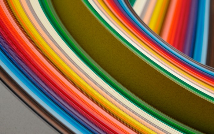 Colorful paper strips arranged in a curve