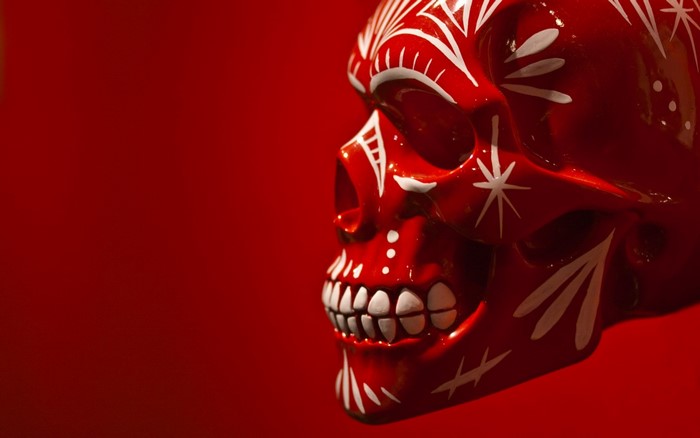 Red skull with white decorative patterns