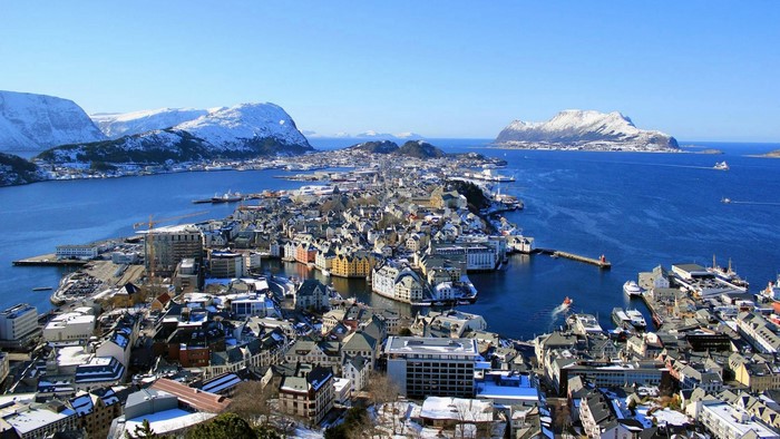 Alesund, Norway: Aerial View of Coastal City and Snow-Capped Mountains