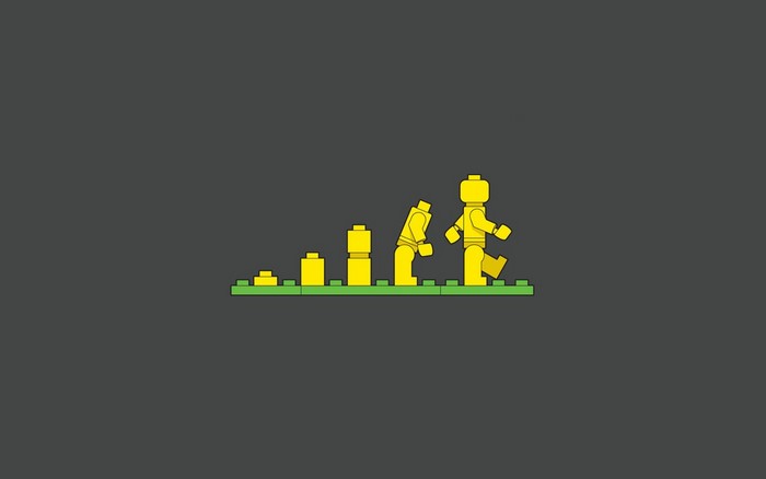 LEGO evolution illustration on a dark background