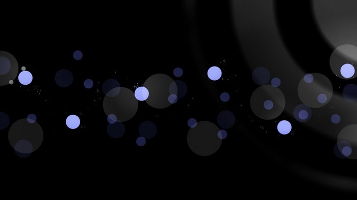 Abstract blue circles and light effects on black