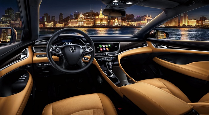 Buick LaCrosse interior with city skyline at night