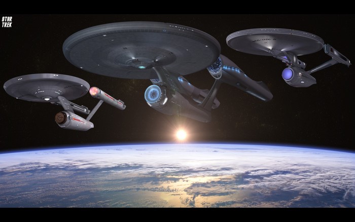 Star Trek USS Enterprise spaceships over Earth