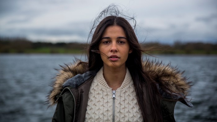 Portrait of a Woman by the Sea on a Windy Day