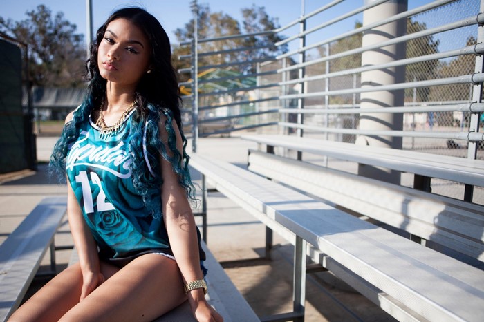 India Westbrooks wearing a blue jersey with roses