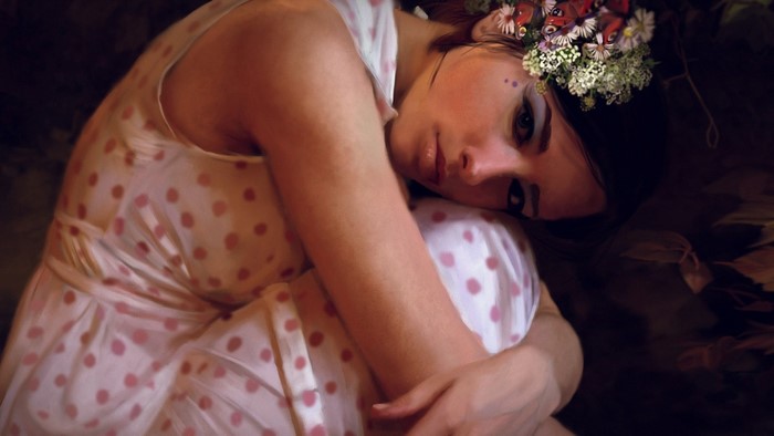 Woman with flower crown and butterflies