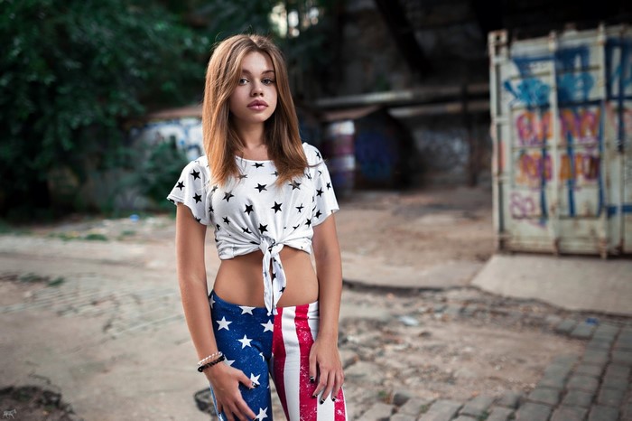 Woman in star print t-shirt and American flag pants