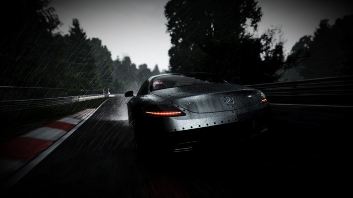 Mercedes-Benz SLS AMG driving on a wet race track
