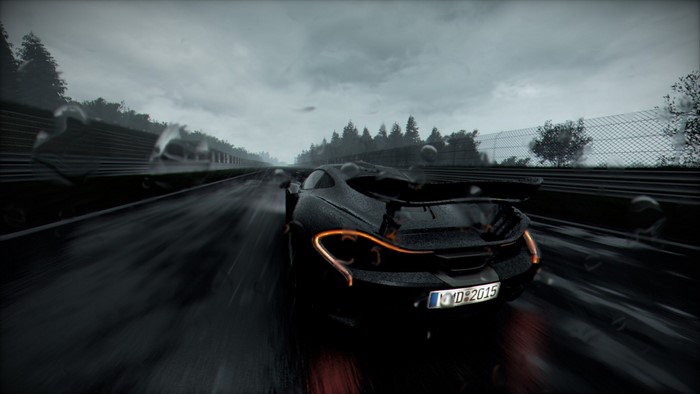 McLaren P1 driving on a wet race track