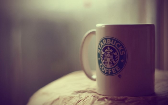 Starbucks coffee mug on a table