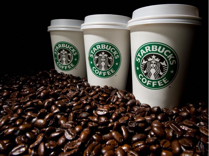 Starbucks coffee cups and beans