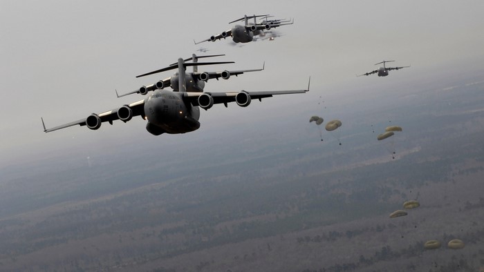 US Air Force C-17 Globemaster III aircraft dropping paratroopers