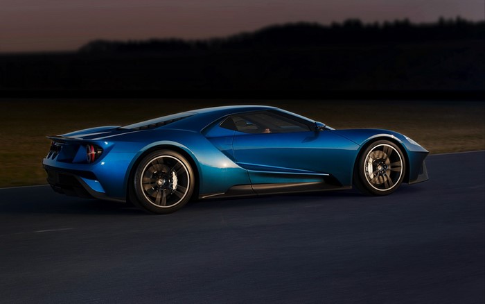 Blue Ford GT sports car on a track
