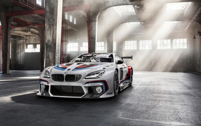 BMW M6 GT3 race car in a garage