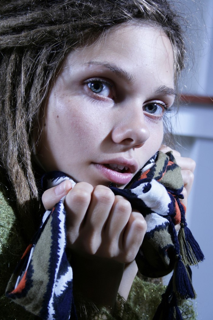 Close up portrait of a young woman with dreadlocks