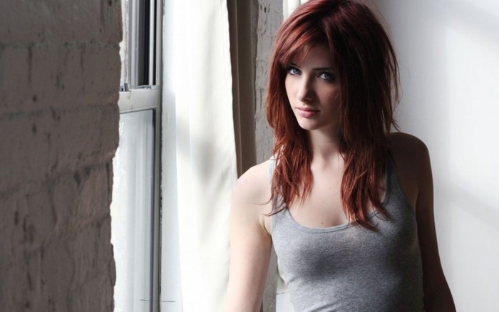Portrait of a Redhead Woman in Gray Tank Top