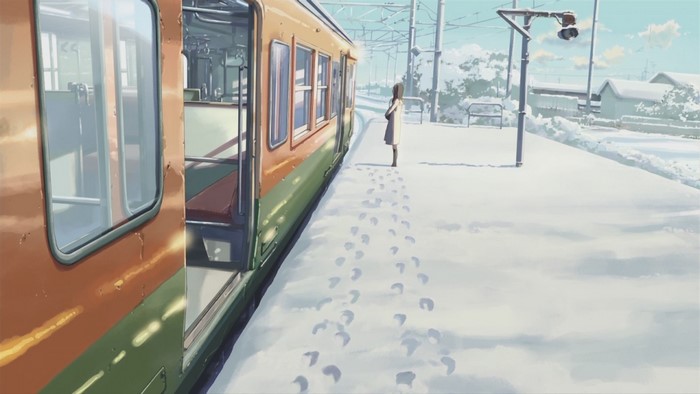 Train station in snow with a girl