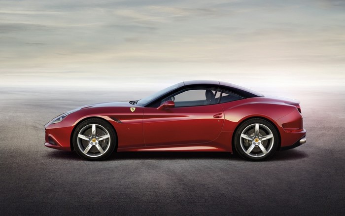Red Ferrari California T parked on asphalt
