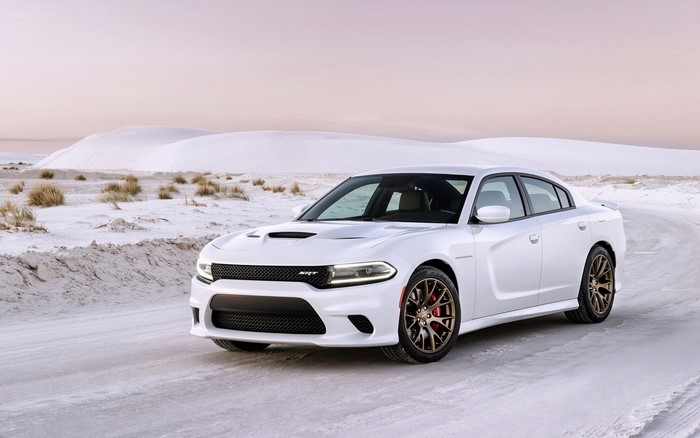 White Dodge Charger SRT Hellcat in a snowy landscape