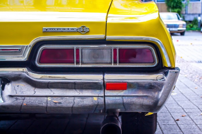 Yellow Chevrolet Impala SS classic car rear view