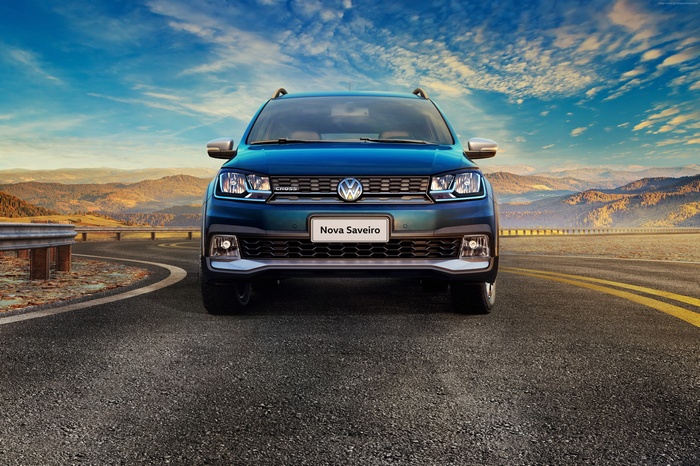 Blue Volkswagen Saveiro Cross CD pickup truck on a road