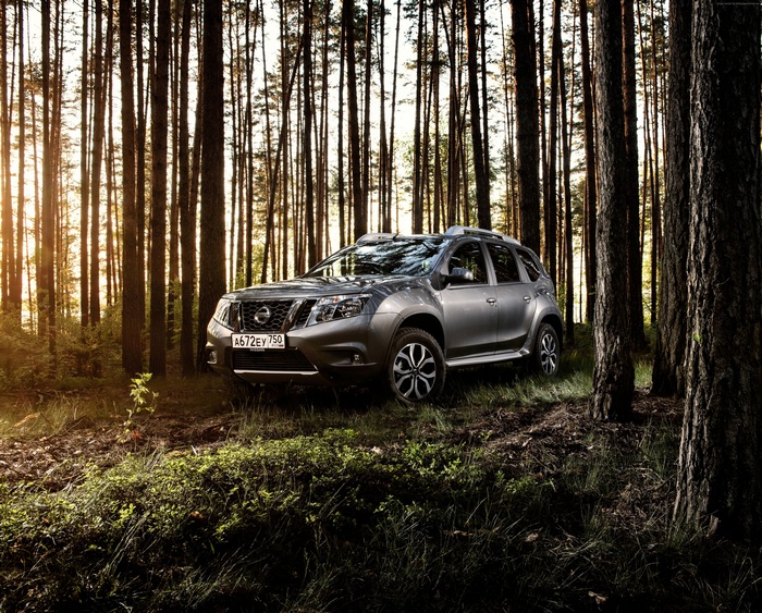 Nissan Terrano crossover in a forest