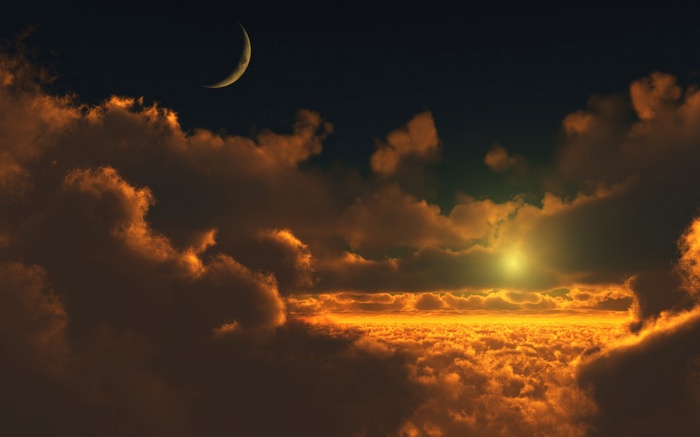 Crescent moon over a sea of clouds at sunset