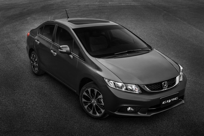 Dark gray Honda Civic sedan on asphalt