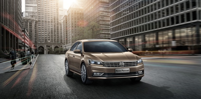 Volkswagen Passat NMS sedan driving in city