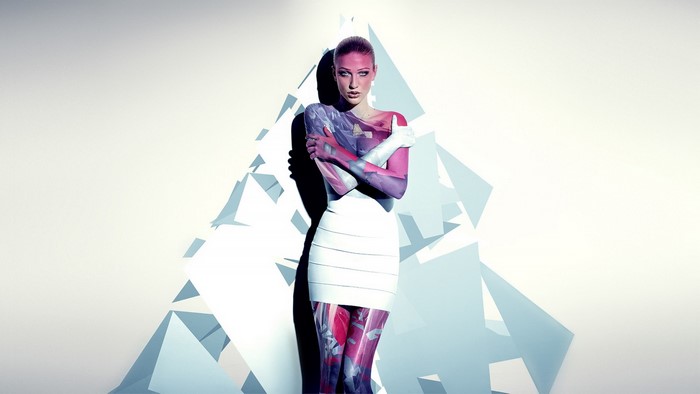 Woman with abstract body paint and white skirt