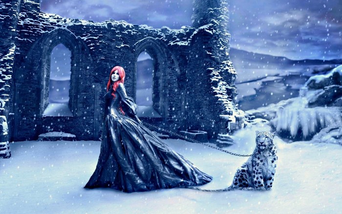 Woman with red hair and snow leopard in winter ruins