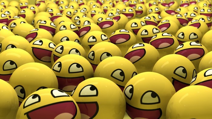 A large group of yellow smiley faces with wide smiles