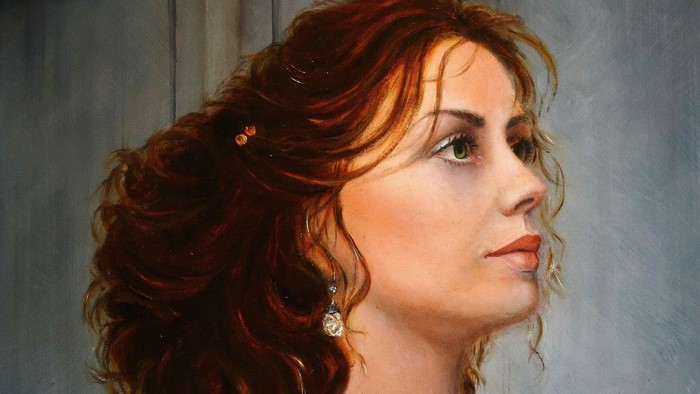 Painting of a woman with red hair in profile