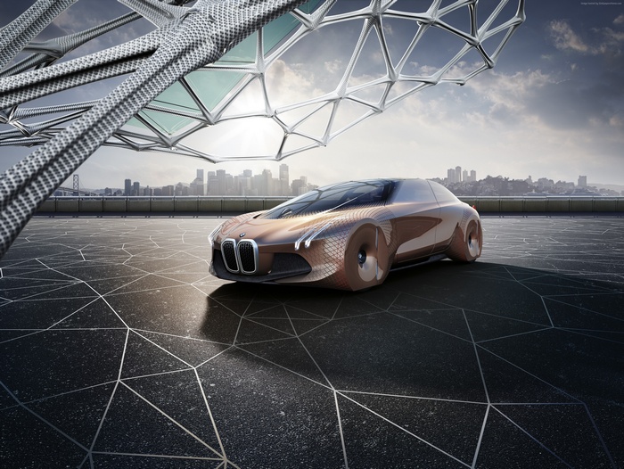BMW Vision Next 100 concept car on a futuristic rooftop