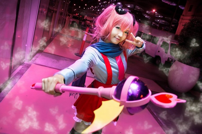 Anime character with pink hair and magic wand