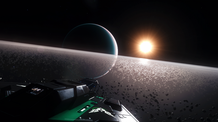 Elite Dangerous: Spaceship near a ringed planet and sun