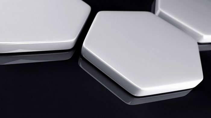 Monochrome 3D hexagons with reflections on black background