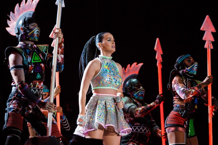 Katy Perry performing on stage with dancers