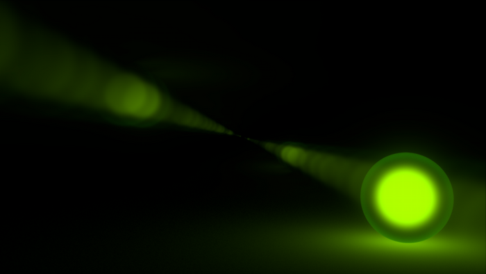 Green orb with light flares on black background