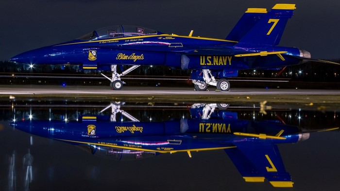 Blue Angels U.S. Navy F/A-18B Hornet on tarmac at night